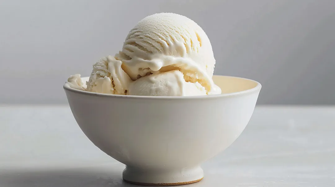 Scoops of Fior di Latte Gelato sitting in a white bowl
